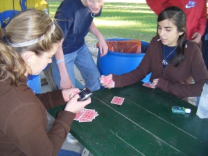 Cards Lizzy and Katie get us started, then everyone sat at the small table to play cards.
